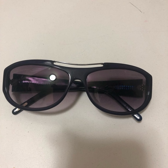 Ted Baker purple sunglasses with a cute design